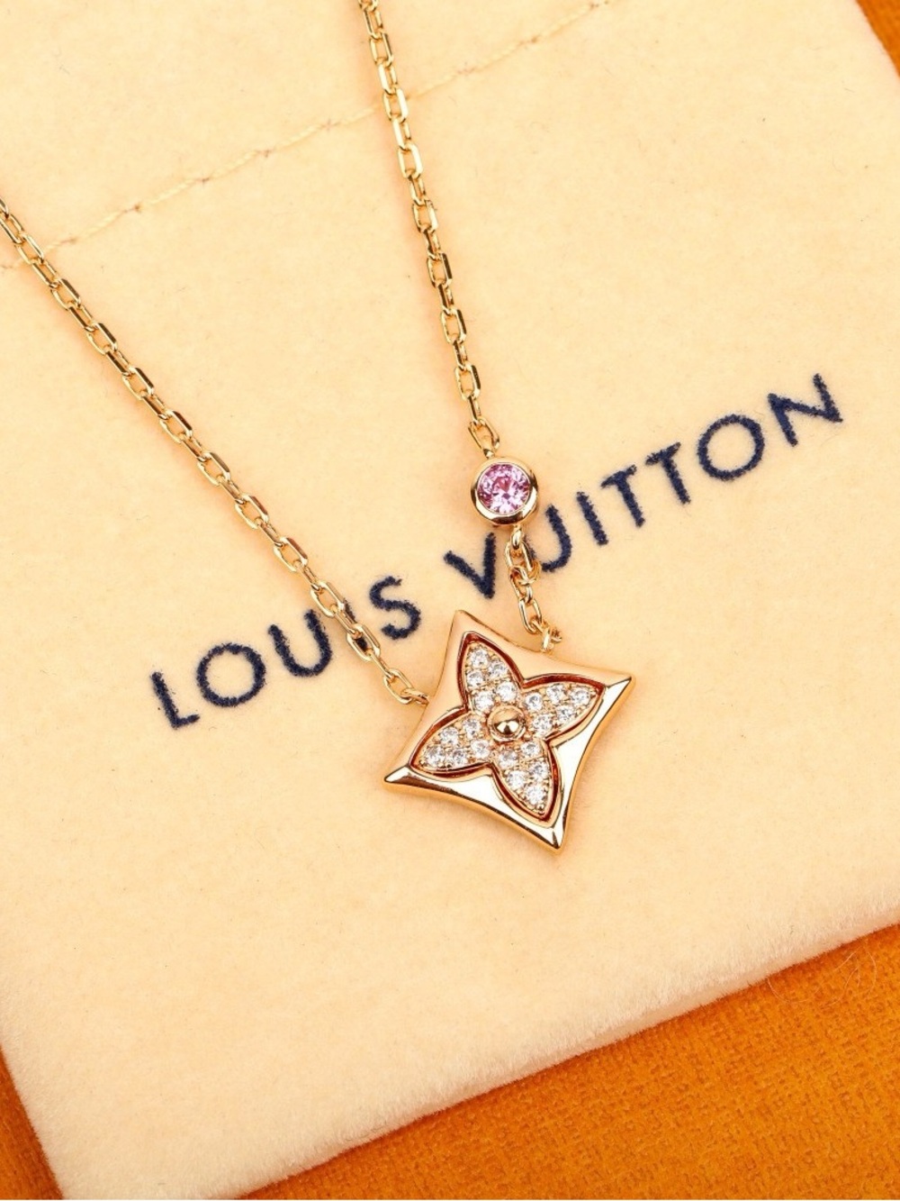 Louis Vuitton Gold-Tone Pendant Necklace with Pink Crystal